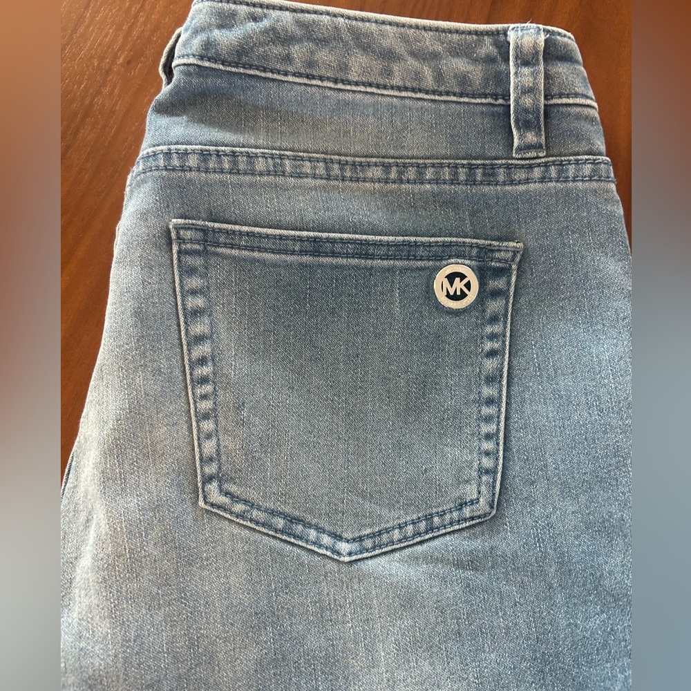 Michael Kors blue jeans with MK rear decal
SZ 8